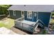Rear view of home, showing private back deck and staircase at 856 Williams White Rd, Zebulon, NC 27597