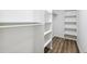 Walk in closet with built-in shelving at 856 Williams White Rd, Zebulon, NC 27597