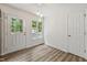 Bright dining area features natural light and easy access to outdoors at 856 Williams White Rd, Zebulon, NC 27597