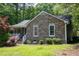 Charming stone facade and well-maintained lawn create great curb appeal at 856 Williams White Rd, Zebulon, NC 27597