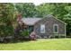 Charming home with manicured lawn and stone front facade at 856 Williams White Rd, Zebulon, NC 27597