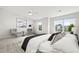 Spacious bedroom with a ceiling fan and a window offering plenty of natural light at 8610 Neuse Landing Ln # 103, Raleigh, NC 27616