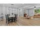 Open-concept dining and living areas featuring modern furnishings and stylish decor at 908 W Garden St, Sanford, NC 27330