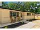 Charming front porch featuring space to relax and a beautifully landscaped garden at 908 W Garden St, Sanford, NC 27330