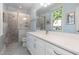 Bathroom with a large vanity and glass shower at 9417 Greenfield Dr, Raleigh, NC 27615