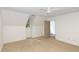 Bright bedroom with neutral carpet, a ceiling fan, and ample natural light from a window at 9417 Greenfield Dr, Raleigh, NC 27615