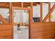 Kitchen featuring a wooden frame opening, with white cabinets, countertops and stainless steel appliances at 9417 Greenfield Dr, Raleigh, NC 27615
