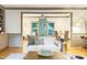 Open-concept space featuring a sofa and view into the dining area, offering a blend of comfort and style at 9417 Greenfield Dr, Raleigh, NC 27615