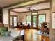 Cozy living room boasts a ceiling fan and natural light from multiple windows at 9417 Greenfield Dr, Raleigh, NC 27615
