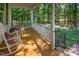 Relaxing front porch with rocking chairs, offering a peaceful spot to unwind at 9417 Greenfield Dr, Raleigh, NC 27615