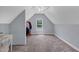Bedroom with angled walls, large window and carpet, ideal for extra living space at 1001 Dairy House Ct, Wake Forest, NC 27587
