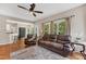 Comfortable living room with modern furnishings, hardwood floors, and lots of natural light at 1001 Dairy House Ct, Wake Forest, NC 27587