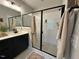 Stylish bathroom featuring a glass shower and modern vanity, blending comfort and design at 1006 Starkville St, Durham, NC 27713