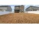 Backyard featuring large grass area and view of screened in porch on home at 1016 Matterhorn Dr, Fuquay Varina, NC 27526