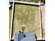Aerial view of backyard surrounded by white fence and the home's dark roof at 1016 Matterhorn Dr, Fuquay Varina, NC 27526