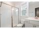 This bathroom has a glass enclosed shower, single vanity and toilet at 1016 Matterhorn Dr, Fuquay Varina, NC 27526