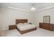 Spacious bedroom features tray ceilings, modern light fixture and ample natural light for a warm ambiance at 1016 Matterhorn Dr, Fuquay Varina, NC 27526