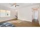 Living room with hardwood flooring, natural light, and view to stairway at 1016 Matterhorn Dr, Fuquay Varina, NC 27526