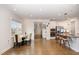 Open-concept space features dining area, modern lighting, and seamless flow into the sleek, well-equipped kitchen at 1016 Matterhorn Dr, Fuquay Varina, NC 27526