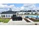 View of a community pool with comfortable lounge chairs and an inviting covered seating area at 1016 Matterhorn Dr, Fuquay Varina, NC 27526