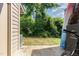 Back patio and yard with mature plantings at 103 Coleridge Ct, Carrboro, NC 27510