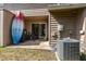 Back patio with sliding doors and air conditioning unit at 103 Coleridge Ct, Carrboro, NC 27510