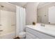 Cozy bathroom with tub and shower and white vanity and fixtures at 103 Coleridge Ct, Carrboro, NC 27510