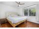Bedroom featuring a ceiling fan, hardwood floors, and window with natural light at 103 Coleridge Ct, Carrboro, NC 27510