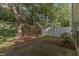 The backyard includes a shady yard with a privacy fence, creating a tranquil outdoor space at 1031 Lake Moraine Pl, Raleigh, NC 27607