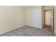 Inviting bedroom showcasing fresh carpeting and neutral walls, offering a blank canvas for personalization at 1031 Lake Moraine Pl, Raleigh, NC 27607