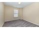 Neutrally decorated bedroom with carpet, natural light and overhead lighting at 1031 Lake Moraine Pl, Raleigh, NC 27607