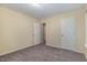 This cozy bedroom features plush carpeting and neutral paint, creating a serene retreat at 1031 Lake Moraine Pl, Raleigh, NC 27607