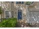 Attractive front door of home features a blue painted door, well-maintained landscaping, and inviting entryway at 1031 Lake Moraine Pl, Raleigh, NC 27607