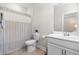 Clean bathroom with shower, toilet, and vanity with sink at 113 Hidden Bluff Dr, Chapel Hill, NC 27517