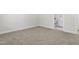Neutral bedroom featuring wall-to-wall carpet and an ensuite bathroom at 113 Hidden Bluff Dr, Chapel Hill, NC 27517