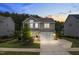 Charming two-story home with a manicured lawn, two car garage, and traditional architectural details at 113 Hidden Bluff Dr, Chapel Hill, NC 27517
