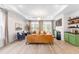Inviting living room boasts a fireplace, ample seating, and large windows, creating a cozy and bright atmosphere at 113 Hidden Bluff Dr, Chapel Hill, NC 27517