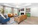 Bright and airy living room features stylish seating, a cozy fireplace, and elegant decor, perfect for relaxation and entertaining at 113 Hidden Bluff Dr, Chapel Hill, NC 27517