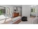 Bright bedroom with sliding glass doors to outdoor patio and en suite bathroom with soaking tub at 11817 Coachmans Way, Raleigh, NC 27614