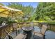 Relaxing backyard deck with ample seating, perfect for outdoor entertaining and leisure at 12505 Garden Tree Ln, Raleigh, NC 27614