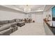 Finished basement with a cozy seating area, game table, and modern lighting at 129 Ruskin Dr, Chapel Hill, NC 27516