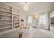 The light, bright bedroom features built in bunk beds, seating, and storage at 129 Ruskin Dr, Chapel Hill, NC 27516