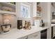 Stylish kitchen features granite countertops, stainless steel appliances, and custom cabinetry at 129 Ruskin Dr, Chapel Hill, NC 27516