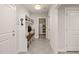 Hallway mudroom featuring a bench, storage, and access to the pantry room at 129 Ruskin Dr, Chapel Hill, NC 27516