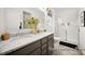 Bathroom featuring a double sink vanity with granite countertop and a glass-enclosed shower with tiled walls at 142 Benson Village Dr # 82, Benson, NC 27504