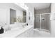 Bathroom features double sinks, glass shower, neutral color palette and modern finishes at 142 Benson Village Dr # 82, Benson, NC 27504
