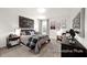 A comfortable bedroom featuring a stylish bed with a decorative headboard, accompanied by a matching dresser at 142 Benson Village Dr # 82, Benson, NC 27504