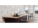 Bright kitchen with a granite island, modern cabinetry, and an adjacent dining area with great natural light at 142 Benson Village Dr # 82, Benson, NC 27504