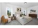 Spacious main bedroom features neutral furniture, large windows and an accent painting at 142 Benson Village Dr # 82, Benson, NC 27504
