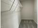 Walk-in closet includes wire shelving for organizing clothes and other items at 159 Coharie Dr, Lillington, NC 27546
